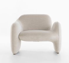 an upholstered chair is shown on a white background with no one around it