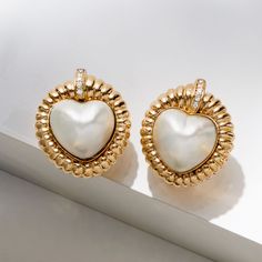 Ross-Simons - C. 1980 Vintage 15x15mm Cultured Mabe Pearl Heart Earrings, .20ct t. w. Diamonds. C. 1980. Beautify every outfit when you don these darling Estate collection earrings! 15x15mm cultured mabe pearl hearts exude the look of luxury inside gleaming 14kt yellow gold ribbed borders with .20 ct. t. w. round brilliant-cut diamond details. Hanging length is 1/2". Clip/post, diamond and white pearl heart earrings. Exclusive, one-of-a-kind Estate Jewelry. Pearl birthstones are the perfect gift Heart-shaped Clip-on Earrings For Valentine's Day Anniversary, Valentine's Day Heart Shaped Clip-on Earrings For Anniversary, Valentine's Day Heart Shaped Clip-on Earrings, Formal Heart-shaped Clip-on Earrings, Heart-shaped Clip-on Jewelry For Formal Occasions, Formal Heart-shaped Clip-on Jewelry, Formal Heart Shaped Clip-on Jewelry, Elegant Clip-on Heart Earrings For Anniversary, Heart-shaped Clip-on Jewelry For Anniversary