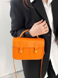 Bag For Love - Minimalist Snap Button Flap Square Bag - Women Satchels Product Description Color Orange Strap Type Adjustable Strap Type Top Handle Pattern Type Plain Style Fashionable Bag Size Small Quantity 1 piece Type Square Bag Composition 100% Polyurethane Material PU Leather Size Chart INCH CM Size Bag Width Bag Height Bag Length Strap Length one-size 2.8 5.3 8.3 47.2 Size Bag Width Bag Height Bag Length Strap Length one-size 7 13.5 21 120 Similar Products h2 { text-align: center; } .red- Trendy Satchel For Fall, Square Satchel With Pockets, Everyday Solid Satchel With Hasp Closure, Rectangular Shoulder Bag With Button Closure, Trendy Orange Everyday Satchel, Trendy Orange Square Satchel, Trendy Satchel For Office, Chic Solid Color Satchel For School, Trendy Solid Color Office Satchel