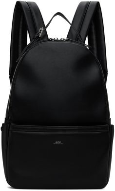 Grained faux-leather backpack in black. · Adjustable pin-buckle carry handle · Adjustable padded shoulder straps · Logo printed at zip pocket · Patch pocket at sides · Padded panel at back face · Two-way zip closure · Zip and patch pockets at interior · Full cotton twill lining · H15.5 x W10.5 x D3.5 Supplier color: Black Leather Work Backpack With Zipper Closure, Leather Workwear Backpack With Zipper Closure, Leather Backpack With Zipper For Work, Black Backpack With Zipper For Work, Backpack Free, Faux Leather Backpack, Men's Backpack, A P, Leather Backpack