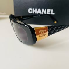 Vintage Authentic Chanel 5014 Gold Sunglasses Extremely Hard To Find This Model. In Pre-Loved Vintage Condition. Very Light Scratches On The Lenses And On The Gold Part And Under The Nose Part. Has A Sign Of Use In Both Of The Handles But Doesn’t Affect The Stability.( Last Two Pic) Please Refer To The Pictures Before Purchasing. Comes With A Regular Protection. Vintage Chanel Glasses, Luxury Vintage Square Frame Sunglasses, Chanel Y2k Sunglasses, Chanel Glasses Sunglasses Black, Chanel Vintage Sunglasses Brown, Chanel Black, Gold Sunglasses, Vintage Chanel, Chanel