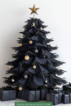 Elegant black Christmas tree decorated with gold and black ornaments