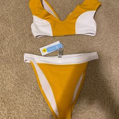 Very Cute Yellow And White Bikini Mustard Swimwear For Summer Poolside, Mustard Swimwear For Poolside In Summer, Yellow Color Block Swimwear For Pool, Yellow Color Block Swimwear For Poolside, Yellow Color Block Swimwear For The Pool, Yellow Color Block Swimwear, Yellow Color Block Swimwear For Swimming, Mustard Swimwear For Beach Season, Summer Yellow Color Block Swimwear