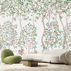 a living room scene with focus on the tree wallpaper