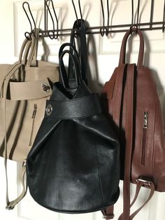 Which color do you like? Taupe, black or bown? Regardless of your choice, this bag is fabulous! It’s stylish and functional. Zip closure with inside zip and slip wall pockets. Checkout all the ways to carry on our website. Available in several colors. #womensbackpack #womensleatherpurse #womensleatherpursesandwallets #orangehandbags #taupehandbags #backpackstyle #leathertote #fashion #pursesandbags Convertible Leather Backpack, Orange Handbag, Italian Leather Handbags, Leather Backpack Purse, Purse Backpack, Leather Products, How To Make Handbags, Givency Antigona Bag, Stitching Leather