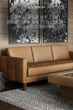 a brown leather couch sitting in front of two framed pictures on a wall next to a coffee table