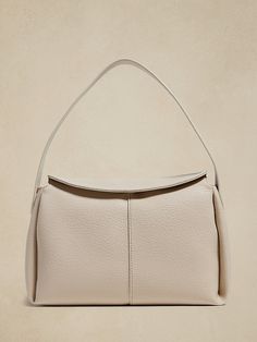 Vegan Leather Shoulder Bag | Banana Republic Factory Chic Smooth Grain Shoulder Bag For Office, Elegant Smooth Grain Shoulder Bag, Elegant Soft Leather Hobo Bag, Versatile Smooth Grain Tote Shoulder Bag, Versatile Tote Shoulder Bag With Smooth Grain, Elegant Formal Soft Leather Hobo Bag, Elegant Faux Leather Bag With Adjustable Strap, Versatile Leather Shoulder Bag With Smooth Grain, Elegant Smooth Grain Hobo Bag For Formal Occasions