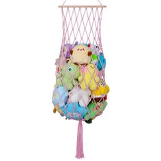 a stuffed animal in a pink net hanging from a hook