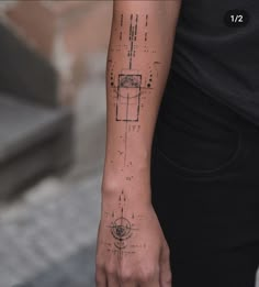 a person with a tattoo on their arm