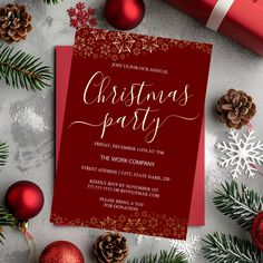 a red christmas party card with gold lettering on it and ornaments around the edges, surrounded by pine cones