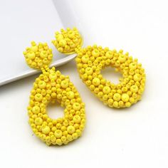 Size:Drop Length: 3 inchWidth: 1.5 inchColor: yellowTrendy Women Statement Earrings Boho Ethnic Dangle Drop Earrings Yellow Resin Beads Jewelry Wedding.These earrings are perfect for gift giving. These earrings will come in Gift Box.All items are handmade and shipped promptly. Please allow extra time when ordering multiple items. Comfortable beads spacers. For a special occasion and just for every day! Cheap Yellow Bohemian Beaded Earrings, Yellow Dangling Beads Earrings For Summer, Yellow Beaded Drop Earrings For Summer, Yellow Teardrop Beaded Earrings With Dangling Beads, Summer Yellow Dangling Beads Earrings, Yellow Summer Earrings With Dangling Beads, Summer Yellow Earrings With Dangling Beads, Yellow Dangling Beads Earrings For Party, Yellow Beaded Dangle Chandelier Earrings