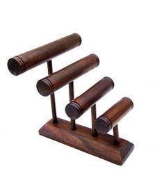 three wooden pegs are stacked on top of each other