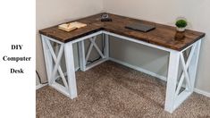 a computer desk made out of wood and metal with the words diy computer desk