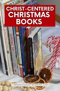 christmas books are stacked on top of each other with candy canes in the foreground