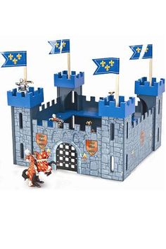 an image of a castle made out of legos with flags on the front and side