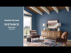 a living room with blue walls and white beams on the ceiling is featured in this ad for sherwinn - williams