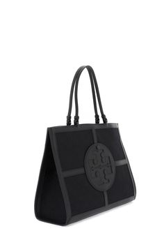 Tory Burch tote bag made of cotton-blend jacquard with iconic all-over T monogram motif and tone-on-tone double T front patch that doubles as an open pocket. Leather trim, double top handle, magnetic closure, fabric interior with one open pocket and one zippered pocket. Size Info STANDARD Color Detail Black Made In Cambodia Material 60%CO 40%PL Season One spring Season Two summer Product bags Brand Tory Burch Size And Fit Bag Length = 42 cm, Bag Height = 32 cm, Handle Height = 22 cm, Tory Burch Tote Bag, T Monogram, Tory Burch Tote, Tory Burch Bag Totes, Monogram Tote Bags, Latest Fashion Design, Monogram Tote, Moon Boots, Mini Wallet