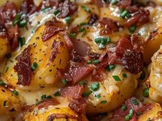 a close up view of some food with bacon and cheese on it's surface