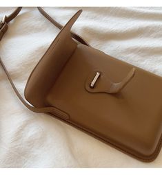 2022 Fall New Style. Your new go-to sling purse is here! Take it everywhere with you, chic, simple, lightweight, and durable. Material: High Quality Soft PU Leather Size: 14cm wide x 21cm tall x 3cm thick (5.5in x 8in x 1in) Designer Style ID: 8423 Chic Camera Leather Bag with Shoulder Strap, Women's Everyday Fashion Handbag Versatile Solid Color Phone Bag For Daily Use, Everyday Solid Color Crossbody Phone Bag, Crossbody Phone Bag For Everyday Use, Chic Shoulder Bag With Cell Phone Pocket, Chic Solid Phone Bag For Travel, Chic Solid Shoulder Bag With Cell Phone Pocket, Travel Shoulder Bag With Mobile Phone Holder, Versatile Phone Bag With Detachable Strap For Office, Modern Shoulder Phone Bag