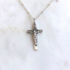 Sterling Silver St. Benedict Crucifix PLEASE NOTE: This item will now likely arrive after Christmas. Thank you! Solid sterling silver St. Benedict Crucifix on 18” silver chain. Crucifix is double sided and approximately 1” tall. Catholic Necklace, Crucifix Necklace, Christmas Thank You, St Benedict, First Communion Gifts, Catholic Jewelry, Classic Gold, Jewelry Inspo, Metal Beads