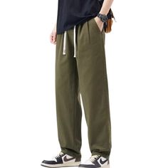 Elevate your everyday style with our Casual Versatile Loose Cargo Pants. Crafted with a relaxed fit, these pants offer the perfect blend of comfort and fashion. Featuring a versatile design and spacious cargo pockets, they're perfect for any occasion. Upgrade your wardrobe now. Features: -85% Cotton,15% Polyester -Mid-rise waist -Multi-Pockets -Regular Fit -Japanese style Baggy Wide-leg Leisure Bottoms, Baggy Green Pants For Leisure, Loose Fit Leisure Pants, Green Baggy Leisure Pants, Green Baggy Pants For Leisure, Baggy Khaki Pants For Loungewear, Casual Loose-fit Wide Leg Parachute Pants, Casual Wide Leg Harem Pants For Leisure, Casual Summer Work Trousers