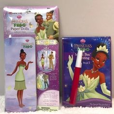 the princess and the frog paper dolls are next to each other