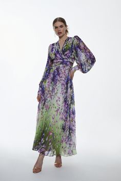 {@@=Ist.Core.Helpers.StringHelper.ToProperCase("Cascading with elegant allure, this woven maxi dress promises to elevate every occasion. A vibrant floral print depicts fallings petals, adding to the overall mood of this fluid silhouette. A pleated design and balloon sleeves add sophistication to this feminine piece.Floral printPleated designBalloon sleevesMaxi hemlineExpertly designed for those 5'3" and under, our Petite pieces are perfectly proportioned for a smaller frame using shorter lengths Wedding Clothes For Women, Croquis Fashion, Latest Maxi Dresses, Flower Maxi Dress, Maxi Dress Collection, Purple Maxi Dress, Maxi Dress Outfit, Pleated Maxi Dress, Floral Print Maxi Dress