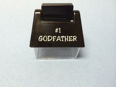 a rubber stamp with the word godfather written on it