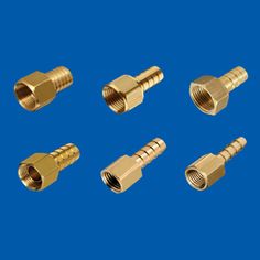 various brass fittings for different types of pipes and hoses on a blue background