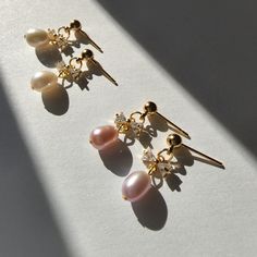 Our cute mini bow pearl earrings are made with natural freshwater pearls, zircon bow knot and 14k gold-plated studs which are good for delicate ears. Size: approx. 0.25" wide and 0.825" long Delicate Pearl Earrings With Cubic Zirconia For Gift, Delicate Cubic Zirconia Pearl Earrings For Gift, Pearl Embellished Cubic Zirconia Earrings As Gift, Dainty Gold Pearl Earrings With Cubic Zirconia, Pearl Charm Earrings With Cubic Zirconia As Gift, Stud Pearl Earrings, Bow Earring, Earring Pearl, Gift Bow