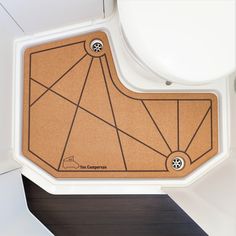 the floor mat is designed to look like it has wheels on it