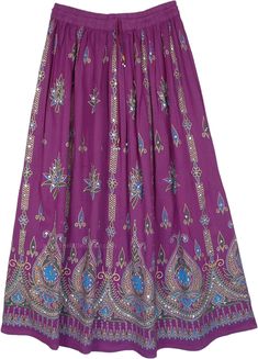 An Indian-style festival skirt in soft rayon fabric with golden and blue painted ethnic motifs and sequin details. This charming purple skirt features floral block motifs with a golden outline, and the motifs are further decorated with sequins that enhance the look. #tlb #Bells #bohogift #Dance #Floral #Printed #Indian #FestivalSkirt #SequinedSkirt #IndieSkirt Bohemian Flowy Skirt Bottoms For Festive Season, Festive Bohemian Lined Skirt, Bohemian Festive Lined Skirt, Bohemian Lined Skirt For Festive Occasions, Bohemian Skirt For Festive Occasions, Purple Long Skirt For Festival, Traditional Harem Skirt For Festivals, Indie Skirt, Crochet Beach Wear Pattern