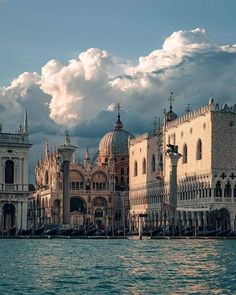 a large building sitting on top of a body of water