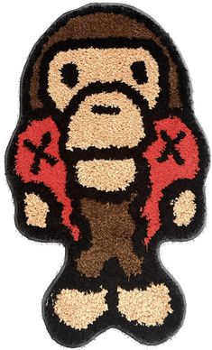 a monkey with boxing gloves on it's head is shown in the shape of a rug