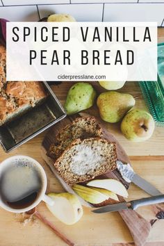 sliced vanilla pear bread on a cutting board with apples, butter and spoons next to it