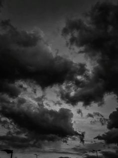 black and white photograph of clouds in the sky