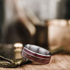 a wooden ring sitting on top of a table