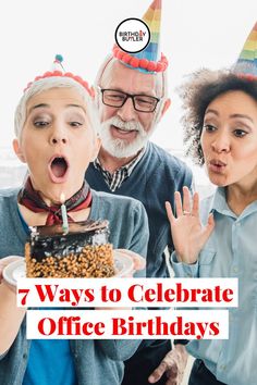 three people with birthday hats on and one woman blowing out the candles on a cake