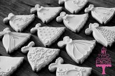 some decorated cookies are sitting on a table