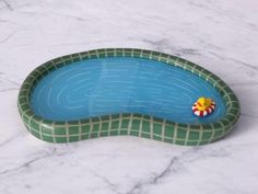 there is a small toy in the pool