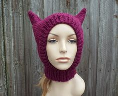 "Pattern: The Wild Thing Balaclava Inspired by the classic shape of a balaclava ski mask, this whimsical knit features pointed cat-like ears. This hat is designed to fit the average 20 - 23 inch adult and teen head. This pattern is recommended for the intermediate to advanced knitter. You'll need to know basic stitches, how to increase, knit in the round on circular needles and how to pick up stitches. If you're a beginning knitter and feeling brave, give this fun knit a try! You will need: Yarn Cat Ear Balaclava, Ski Mask Pattern, Cat Ear Hat Pattern, Cat Hats Knitted, Pink Cat Hat, Cat Hat Pattern, Balaclava Ski Mask, Cat Ears Hat, Hood Pattern