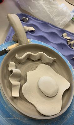 the pottery is being made and ready to be put into its own bowl for painting