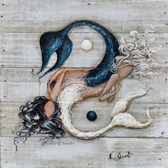 a painting of a mermaid with her hair blowing in the wind, on wood planks