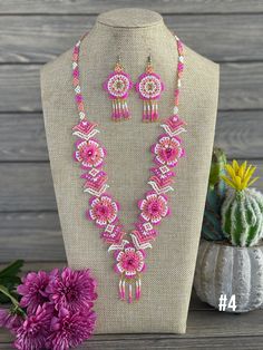 This gorgeous handmade beaded Jewelry Set is the perfect addition of color, style and beauty to any outfit! So much love and time go into making these beaded jewelry sets. They are handmade just for you in Chiapas, Mexico. Pink Artisan Beaded Jewelry, Traditional Pink Adjustable Beaded Necklaces, Traditional Pink Beaded Necklaces, Hand-strung Pink Jewelry For Festivals, Traditional Adjustable Pink Beaded Necklace, Pink Hand-strung Jewelry For Festival, Artisan Pink Jewelry With Round Beads, Traditional Handmade Pink Beads, Pink Beaded Necklaces With Round Beads For Crafting