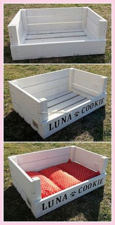 two white wooden crates with red cushions on the top and bottom, one is empty