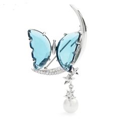 18k White Gold Plated Pearl Moon Crystal Butterfly Brooch Size:5.5*2.9cm Weight:8.1g Crystal Copper Czech Rhinestone Color: Blue A Brooch Can Go Anywhere On A Coat, A Cardigan, A Bag, A Pair Of Heels, A Belt, On A Scarf, On A Dress, In Your Hair, And Even On A Wedding Cake! Bundle & Save Fast Shipping Offers Welcome Posh Ambassador Over 300 Love Notes Please Look At My Other Be Blue Gemstone Brooch For Gift, Elegant Blue Gemstone Brooch, Elegant Blue Gemstone Brooches, Celestial Brooch Jewelry As Gift, Celestial Brooch Jewelry As A Gift, Celestial Style Brooch Jewelry As Gift, Elegant Blue Moon-shaped Jewelry, Swarovski Brooch, Face Brooch