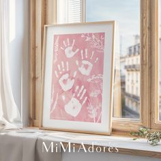 an image of a handprint in front of a window