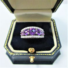 Judith Ripka Sterling 7 Gemstones, Amethyst Ring, 4+ carats of Peridot , Plenty of carats CZ stone set along both sides, Size 7,Vintage, Excellent Condition  Box not included. 2013 design, Countless carats Ring stamped Judith Ripka, Thailand CZs Wedding Amethyst Gemstones With Diamond Accents, Elegant Multi-stone Amethyst Collectible Ring, Amethyst Gemstones With Gemstone Accents For Anniversary, Amethyst Gemstones With Accents For Anniversary, Amethyst Accent Stones For Anniversary, Anniversary Amethyst Gemstones With Accent Stones, Anniversary Amethyst Accent Stones, Classic Diamond Multi-stone Amethyst Ring, Formal Multi-stone Amethyst Ring With Round Cut