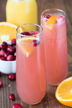 two glasses filled with cranberry lemonade and orange juice