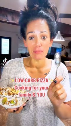 a woman holding a bowl of food with the words low carb pizza cooking for your family & you